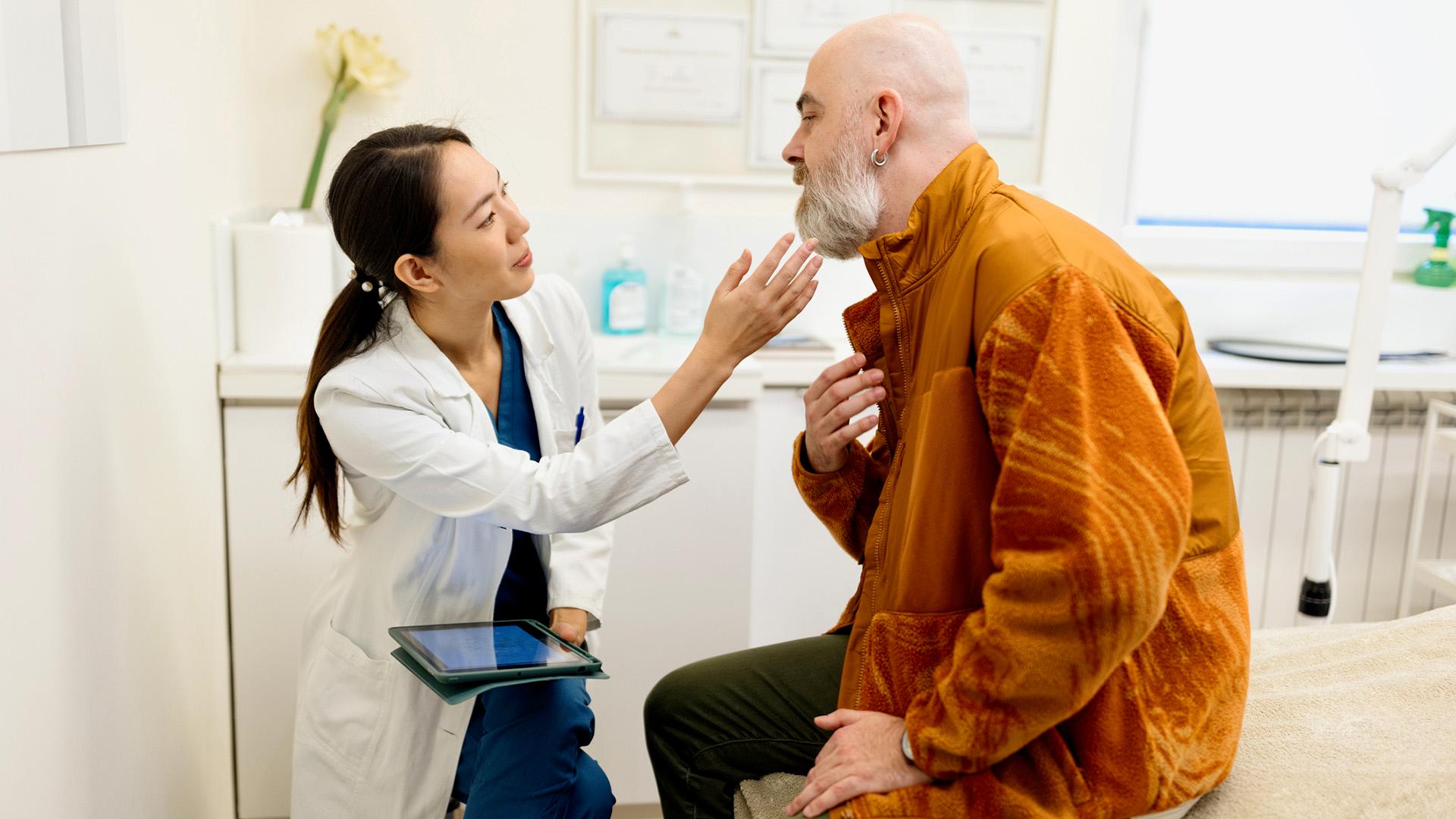 Man at a doctor's office doing his examination