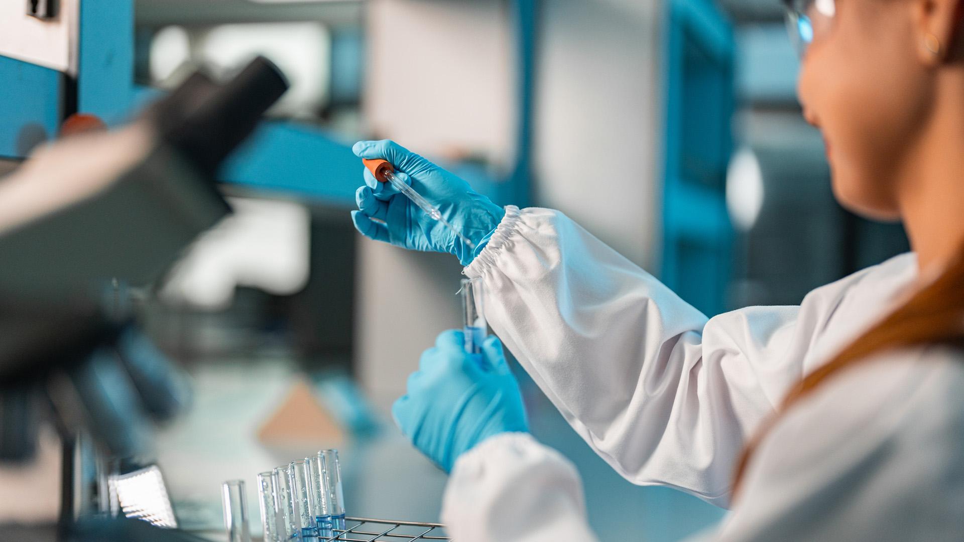 Young female scientist conducting research in a lab